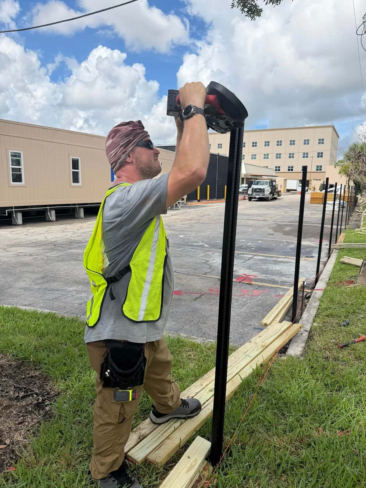 Swi Fence Florida Crew Member Installing Fence Posts