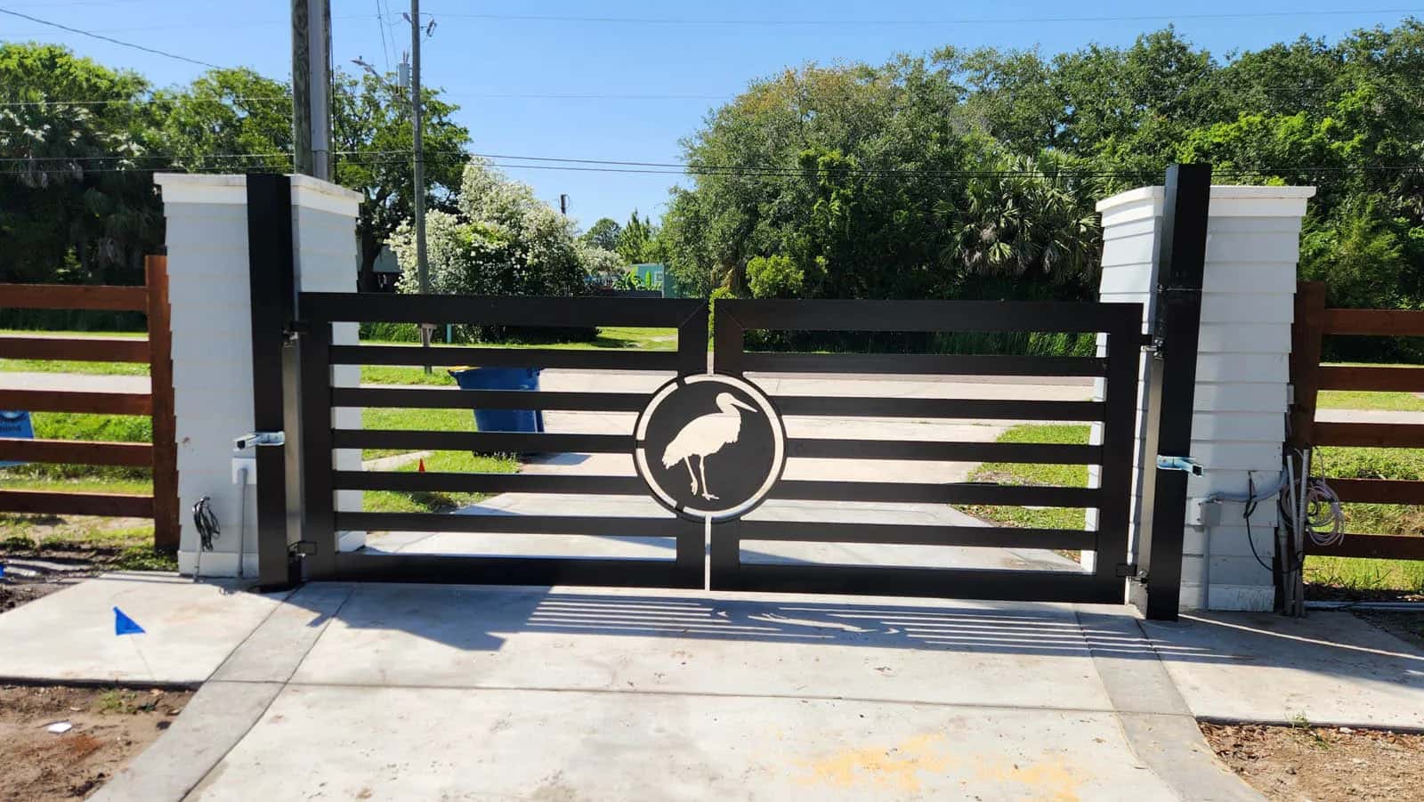 Florida Custom Estate Driveway Gate With Custom Heron Emblem Logo 2