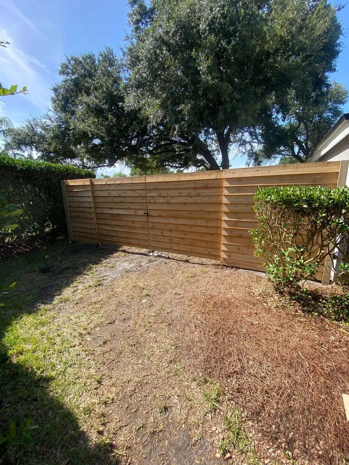 Florida Horizontal Wood Cedar Feathered Edge Privacy Fence With Double Gate