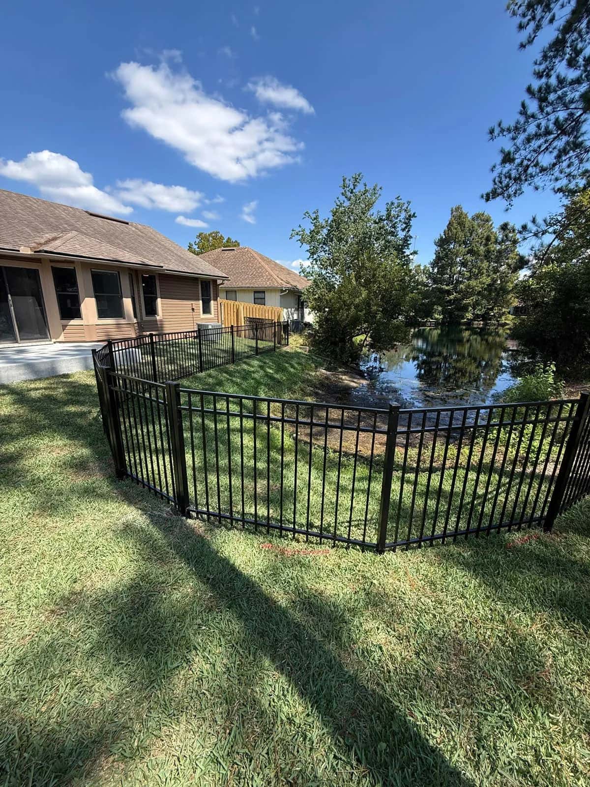 Florida 4 Foot 3 Rail Aluminum Fence Curved Around Water Feature
